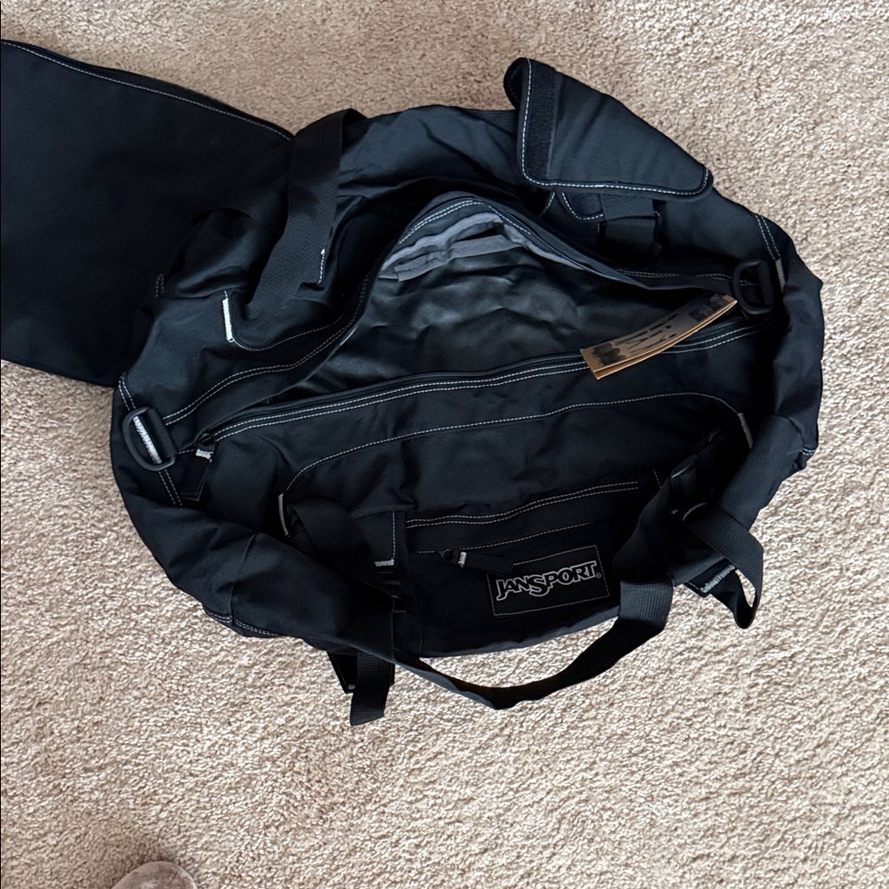 Jansport Jet Black duffel Bag-  two straps can use as backpacks